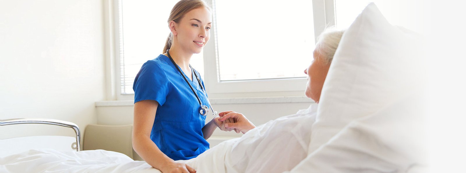 nurse talking to senior